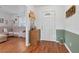 Inviting entryway with hardwood floors and view of living room at 400 Fleeta Dr, Covington, GA 30016