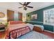 Spacious main bedroom with king-size bed and wood flooring at 400 Fleeta Dr, Covington, GA 30016