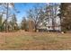 Large backyard with plenty of space for outdoor activities at 4399 Plantation Ln, Norcross, GA 30093