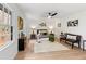 Main bedroom with large windows and ceiling fan at 4399 Plantation Ln, Norcross, GA 30093