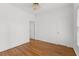 This bedroom features hardwood floors and a closet at 8240 Knollbrook Ln, Mcdonough, GA 30253