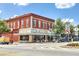 Charming corner building featuring the 'bread butter bread butter' store front with white accents at 1257 Pj East Rd, Covington, GA 30014