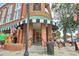 Inviting street view of 'Scoops' entrance, featuring classic brickwork and charming awnings at 1257 Pj East Rd, Covington, GA 30014