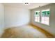 Bright room with white walls, large windows providing natural light, and clean modern trim at 1257 Pj East Rd, Covington, GA 30014