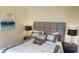 Guest bedroom with gray headboard and modern decor at 215 Piedmont Ne Ave # 708, Atlanta, GA 30308