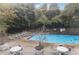 Relaxing pool area with lounge chairs and tables at 215 Piedmont Ne Ave # 708, Atlanta, GA 30308