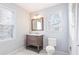 Simple bathroom with single vanity and neutral decor at 673 Windsor Sw St, Atlanta, GA 30310