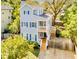 Two-story house with gray siding, multiple windows, and a deck at 673 Windsor Sw St, Atlanta, GA 30310