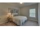 Cozy bedroom with window and neutral decor at 1890 Cobblefield Cir, Dacula, GA 30019