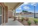 Brick front porch with stone columns, overlooking a neighborhood at 1890 Cobblefield Cir, Dacula, GA 30019