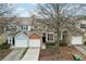 Townhouse community with tree-lined streets and a well-maintained lawn at 577 Reed Se St, Atlanta, GA 30312