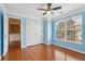 Blue bedroom with hardwood floors and double doors at 577 Reed Se St, Atlanta, GA 30312