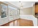 Bright dining room with hardwood floors and french doors leading to a patio at 577 Reed Se St, Atlanta, GA 30312