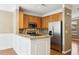 Kitchen with granite countertops, stainless steel appliances, and wood cabinets at 577 Reed Se St, Atlanta, GA 30312