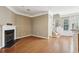 Hardwood floor living room with fireplace and staircase to upper level at 577 Reed Se St, Atlanta, GA 30312