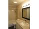 Bathroom with granite countertop, updated vanity, and shower/tub combo at 1101 Mill Pond Se Dr, Smyrna, GA 30082