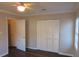 Bedroom with double door closet and hardwood floors at 1101 Mill Pond Se Dr, Smyrna, GA 30082