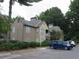 Tan building exterior with parking at 1101 Mill Pond Se Dr, Smyrna, GA 30082