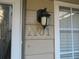 House number 1101 with exterior light fixture at 1101 Mill Pond Se Dr, Smyrna, GA 30082