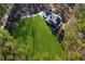 An aerial view of a large house with a spacious green lawn at 3505 Moss Landing Rd, Acworth, GA 30102