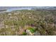Aerial view of a home on a large lot near a lake at 3505 Moss Landing Rd, Acworth, GA 30102