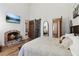 Main bedroom with sliding barn door and fireplace at 3505 Moss Landing Rd, Acworth, GA 30102