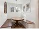 Built-in breakfast nook with wooden table and bench seating at 3505 Moss Landing Rd, Acworth, GA 30102