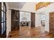 Open concept entry with hardwood floors and views of dining area at 3505 Moss Landing Rd, Acworth, GA 30102