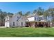 Two-story farmhouse with wrap-around porch and expansive lawn at 3505 Moss Landing Rd, Acworth, GA 30102