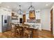 Modern kitchen featuring granite countertops, stainless steel appliances, and hardwood floors at 3505 Moss Landing Rd, Acworth, GA 30102