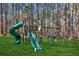 Wooden playset with slide and swings in backyard at 3505 Moss Landing Rd, Acworth, GA 30102