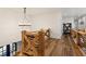 Elegant upper hall with hardwood floors and wooden railing at 3505 Moss Landing Rd, Acworth, GA 30102