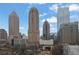 Impressive city view featuring iconic skyscrapers and a clear blue sky at 1080 Peachtree Ne St # 804, Atlanta, GA 30309