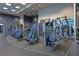 Community gym features weight machines and neutral color palette at 1080 Peachtree Ne St # 804, Atlanta, GA 30309