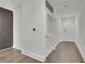 Bright hallway featuring hardwood floors, neutral walls and access to a large storage space at 1080 Peachtree Ne St # 804, Atlanta, GA 30309