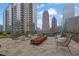 Modern outdoor firepit area with comfortable seating and city views at 1080 Peachtree Ne St # 804, Atlanta, GA 30309