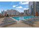 Resort style pool with sundeck and comfortable lounge chairs at 1080 Peachtree Ne St # 804, Atlanta, GA 30309