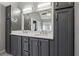 Bathroom with gray cabinets and quartz countertops at 2035 Walnut Creek Xing, Alpharetta, GA 30005