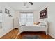 Bedroom with hardwood floors and a ceiling fan at 2035 Walnut Creek Xing, Alpharetta, GA 30005