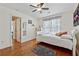 Bedroom with hardwood floors and a ceiling fan at 2035 Walnut Creek Xing, Alpharetta, GA 30005