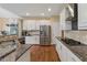 Kitchen with granite countertops, stainless steel appliances, and white cabinets at 2035 Walnut Creek Xing, Alpharetta, GA 30005