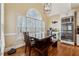 Charming kitchen nook with a built-in bench and large window overlooking the backyard at 2035 Walnut Creek Xing, Alpharetta, GA 30005