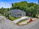 Charming gray house with a red door, driveway, and small fenced yard at 261 Fletcher Sw St, Atlanta, GA 30315