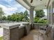 Inviting front porch with brick columns and seating area, perfect for relaxing at 261 Fletcher Sw St, Atlanta, GA 30315