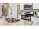 Modern kitchen with stainless steel appliances and granite countertops at 261 Fletcher Sw St, Atlanta, GA 30315