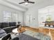 Cozy living room with gray sectional sofa, coffee table, and hardwood floors at 261 Fletcher Sw St, Atlanta, GA 30315