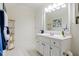 Bright bathroom with a modern vanity, sleek fixtures, and a well-lit mirror; neatly organized and stylish at 4086 Haverhill Dr, Atlanta, GA 30342