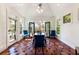 Dining room with tile flooring, lots of light and french doors leading to deck at 4086 Haverhill Dr, Atlanta, GA 30342