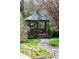 Exterior view of backyard gazebo with lights and manicured landscaping at 4086 Haverhill Dr, Atlanta, GA 30342