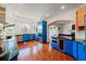 Bright and airy kitchen with blue cabinets, stainless steel appliances, and lots of storage at 4086 Haverhill Dr, Atlanta, GA 30342